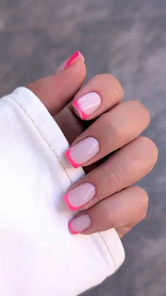 French manicure with neon pink tips