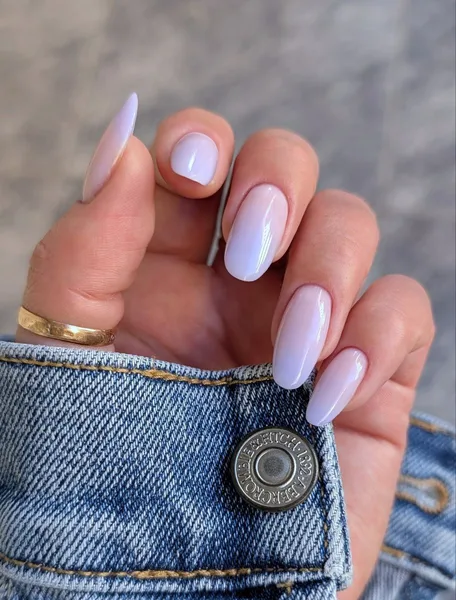 Soft lavender gel polish on almond nails